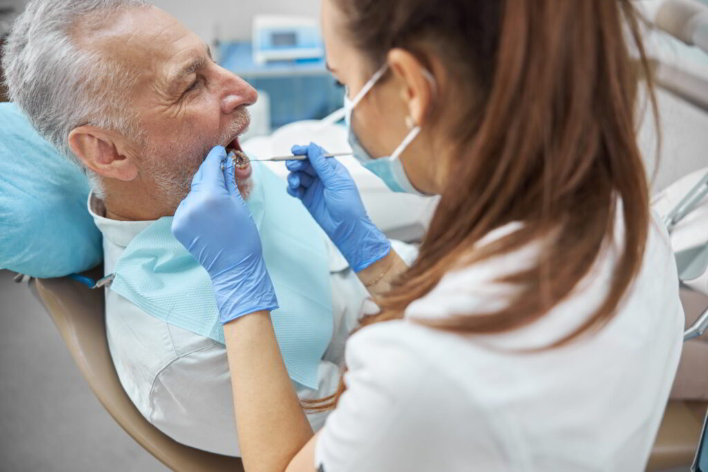 Dentist diagnosing