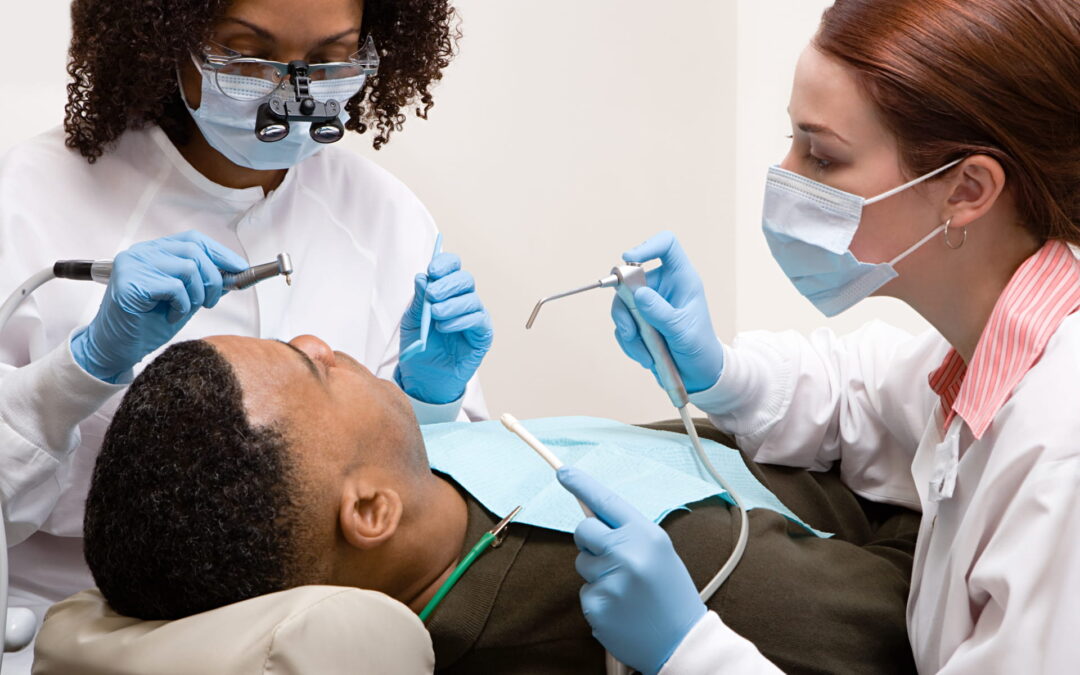 New Orleans dentist working on dental patient
